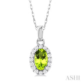 5x3 MM Oval Shape Peridot and 1/20 Ctw Round Cut Diamond Halo Semi-Precious Pendant with Chain in 14K White Gold