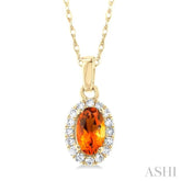 5x3 MM Oval Shape Citrine and 1/20 Ctw Round Cut Diamond Halo Semi-Precious Pendant with Chain in 10K Yellow Gold