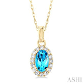 5x3 MM Oval Shape Blue Topaz and 1/20 Ctw Single Cut Diamond Halo Semi-Precious Pendant with Chain in 14K Yellow Gold
