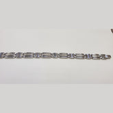 14 karat white gold mens bracelet with diamonds set in the center of each link .