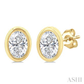 1/5 Ctw Petite Bezel Set Oval Cut Diamond Fashion Stud Earring in 10K Yellow Gold