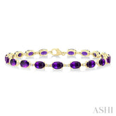 6X4 MM Oval Cut Amethyst and 1/6 Ctw Round Cut Diamond Semi-Precious Tennis Bracelet in 10K Yellow Gold