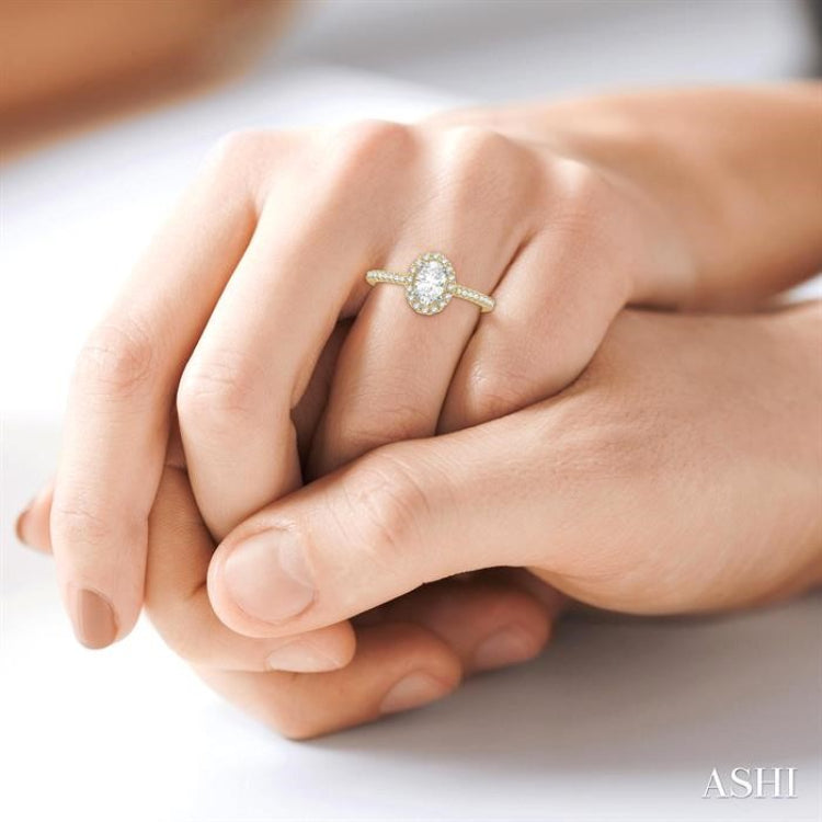 3/8 Ctw Diamond Ladies Engagement Ring with 1/4 Ct Oval Cut Center Stone in 14K Yellow and White Gold