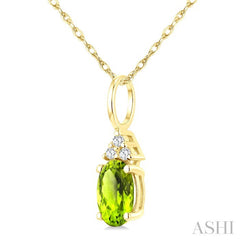 1/50 Ctw Oval Cut 6X4 MM Peridot and Round Cut Diamond Semi-Precious Pendant With Chain in 10K Yellow Gold