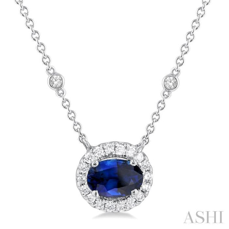 6x4 MM Oval Cut Sapphire and 1/6 Ctw Round Cut Diamond East West Halo Precious Necklace in 14K White Gold