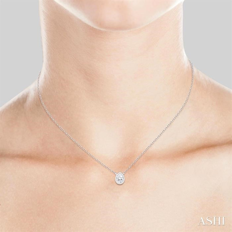 1/6 ctw Petite Bezel Set Pear Cut Diamond Fashion Pendant With Chain in 10K White Gold