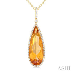 26x9 MM Pear Cut Citrine and 1/4 Ctw Round Cut Diamond Halo Semi-Precious Pendant With Chain in 14K Yellow Gold